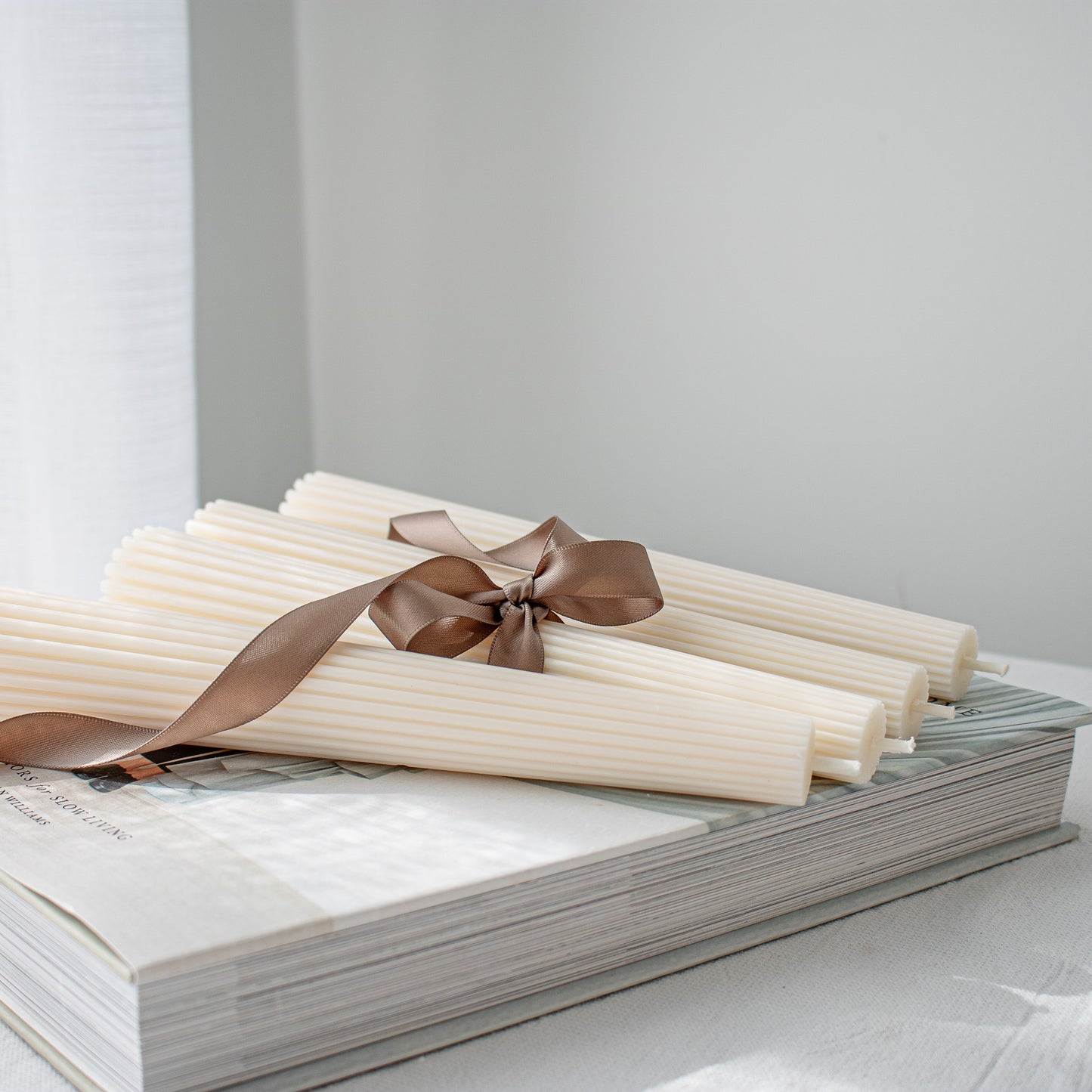 white elegant taper candle decor