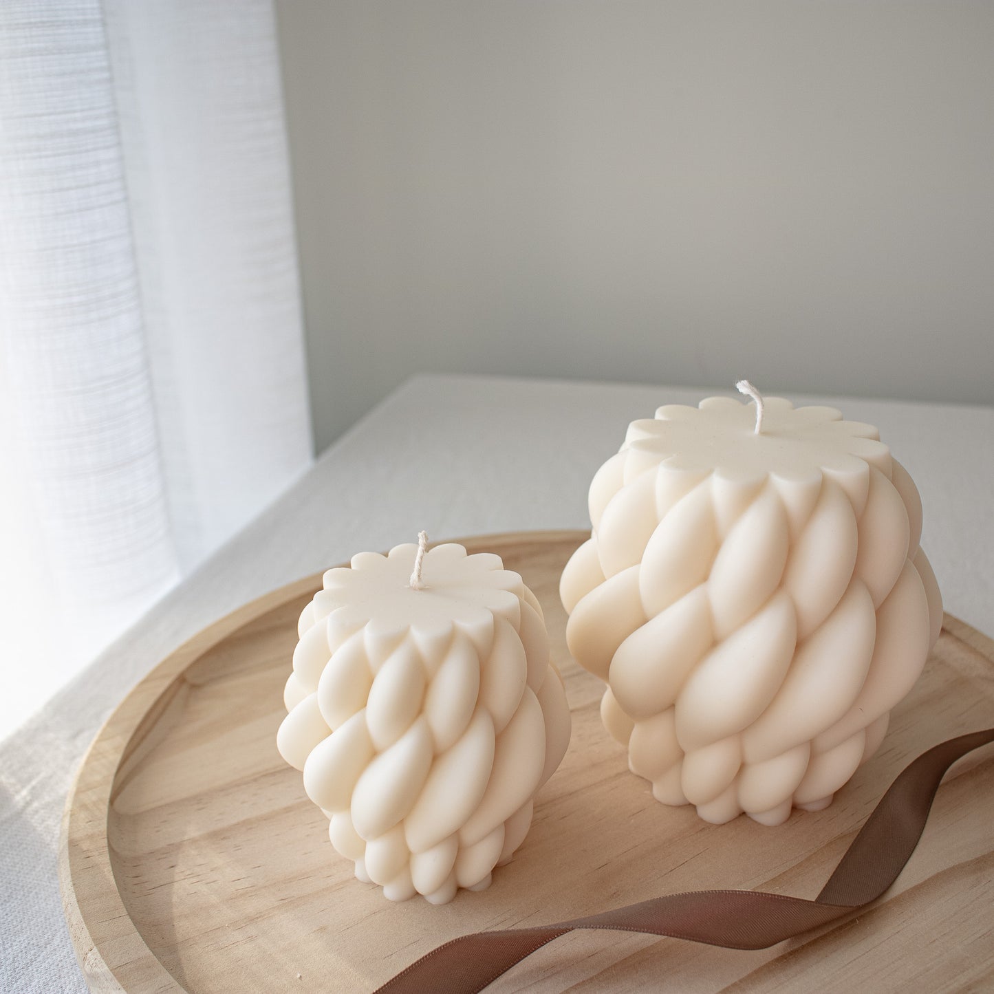 interwoven decorative pillar candle