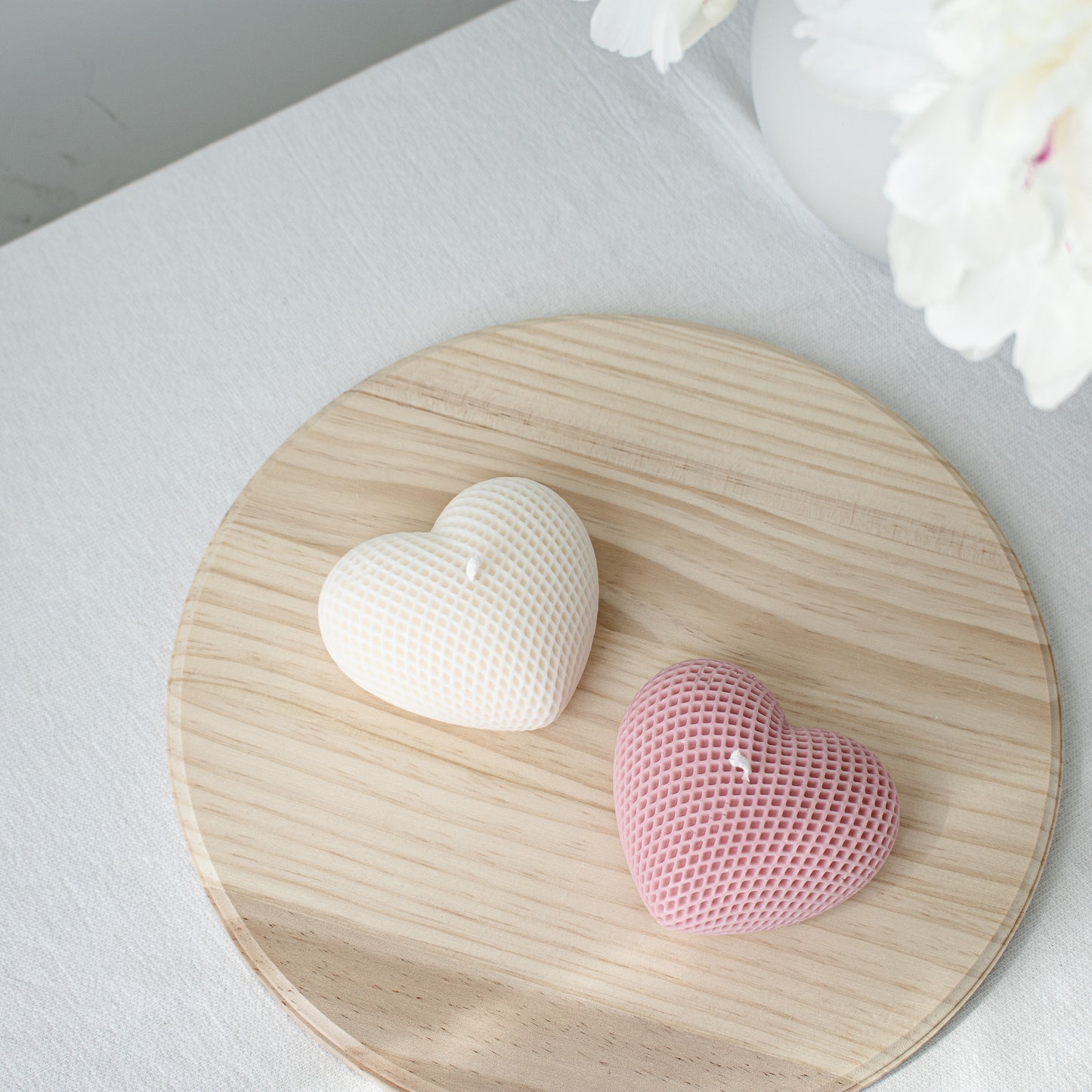 pink and white heart shaped soy candle