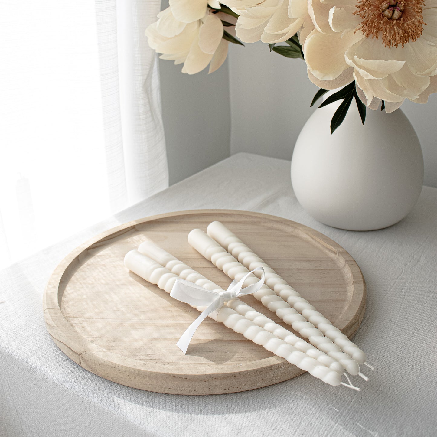 elegant taper candles in cream white color