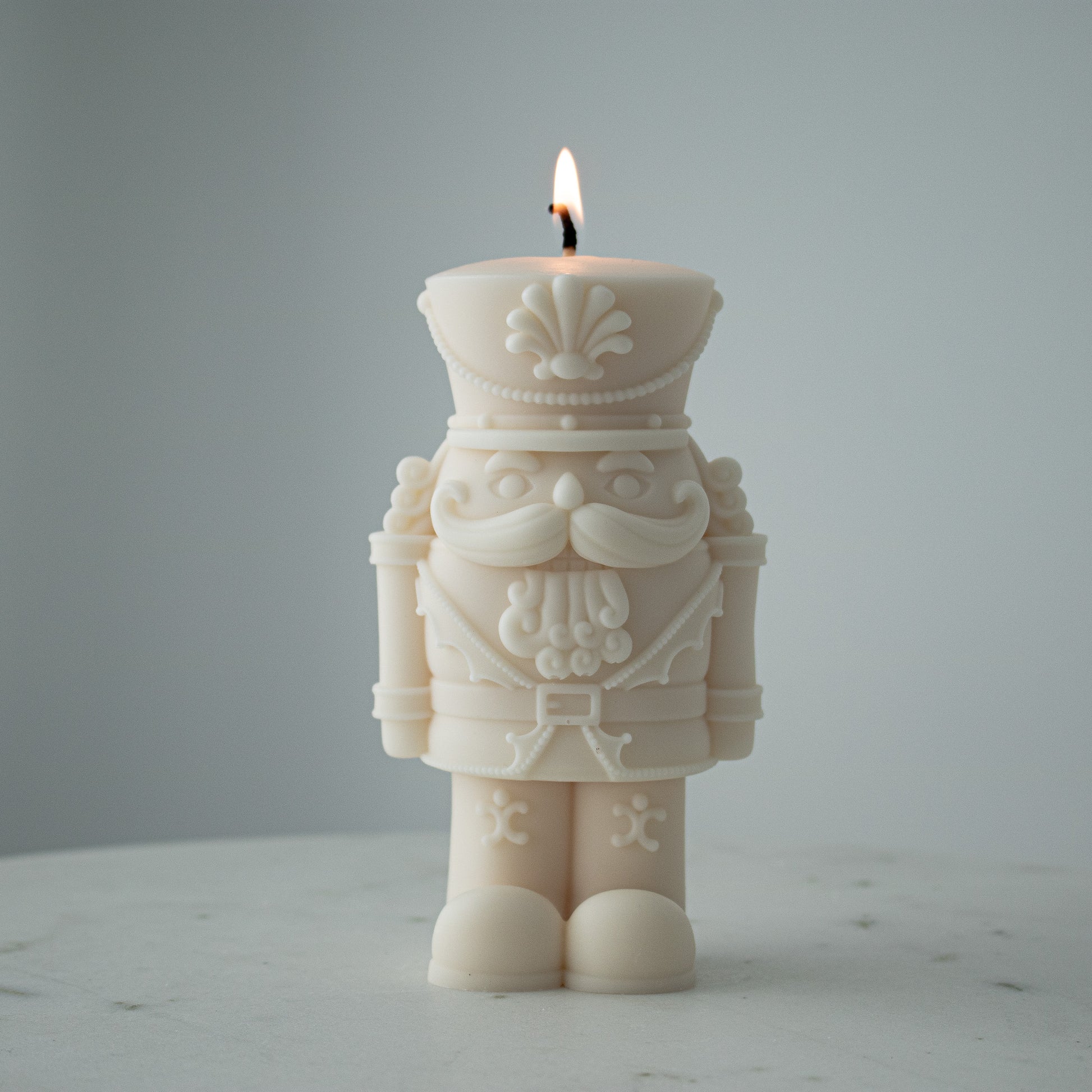 nutcracker shaped decorative candle for the holiday