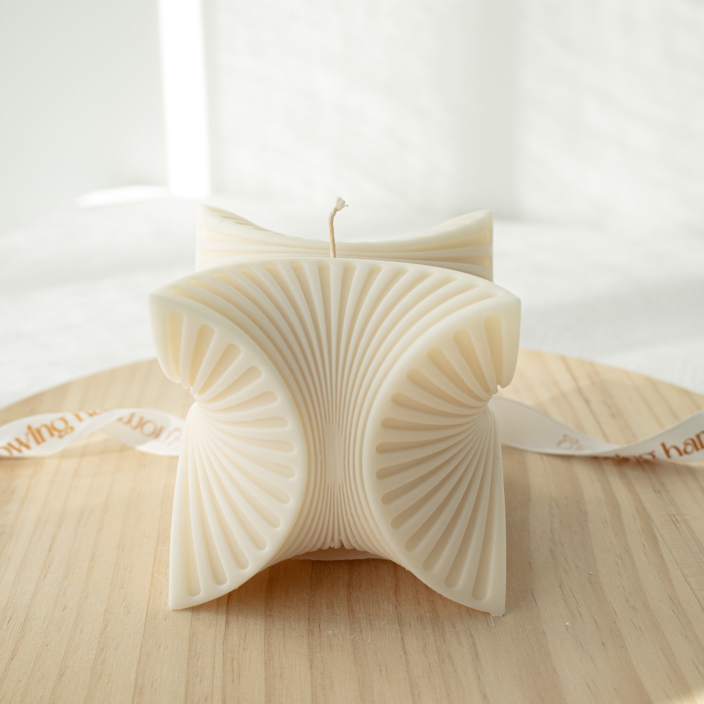 geometric cube shaped candle in cream white