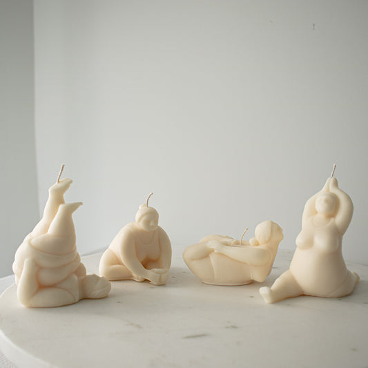 candles portraying abstract chubby people doing yoga 