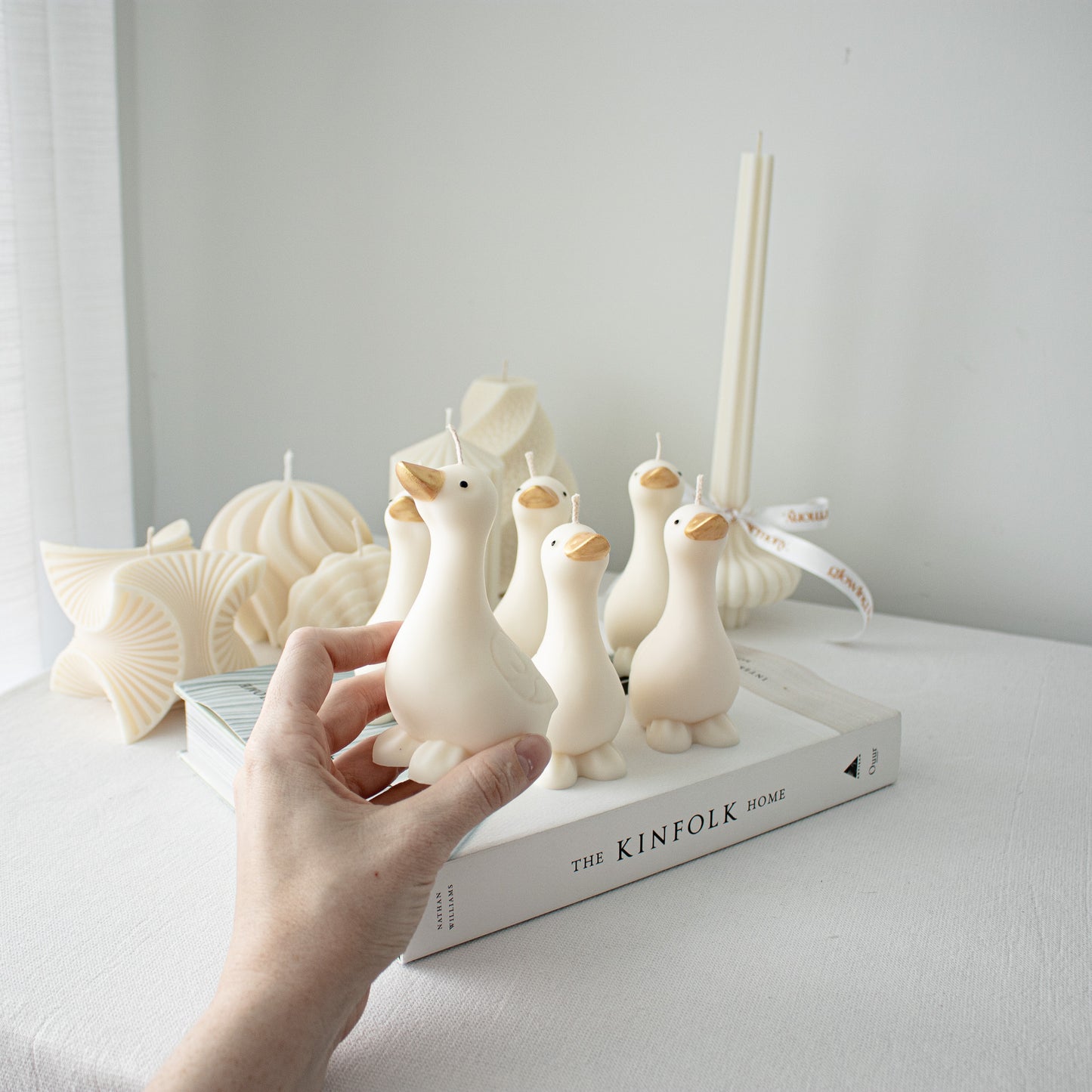 Goose shaped candles handcrafted with detailed painted features, whimsical farm inspired decor